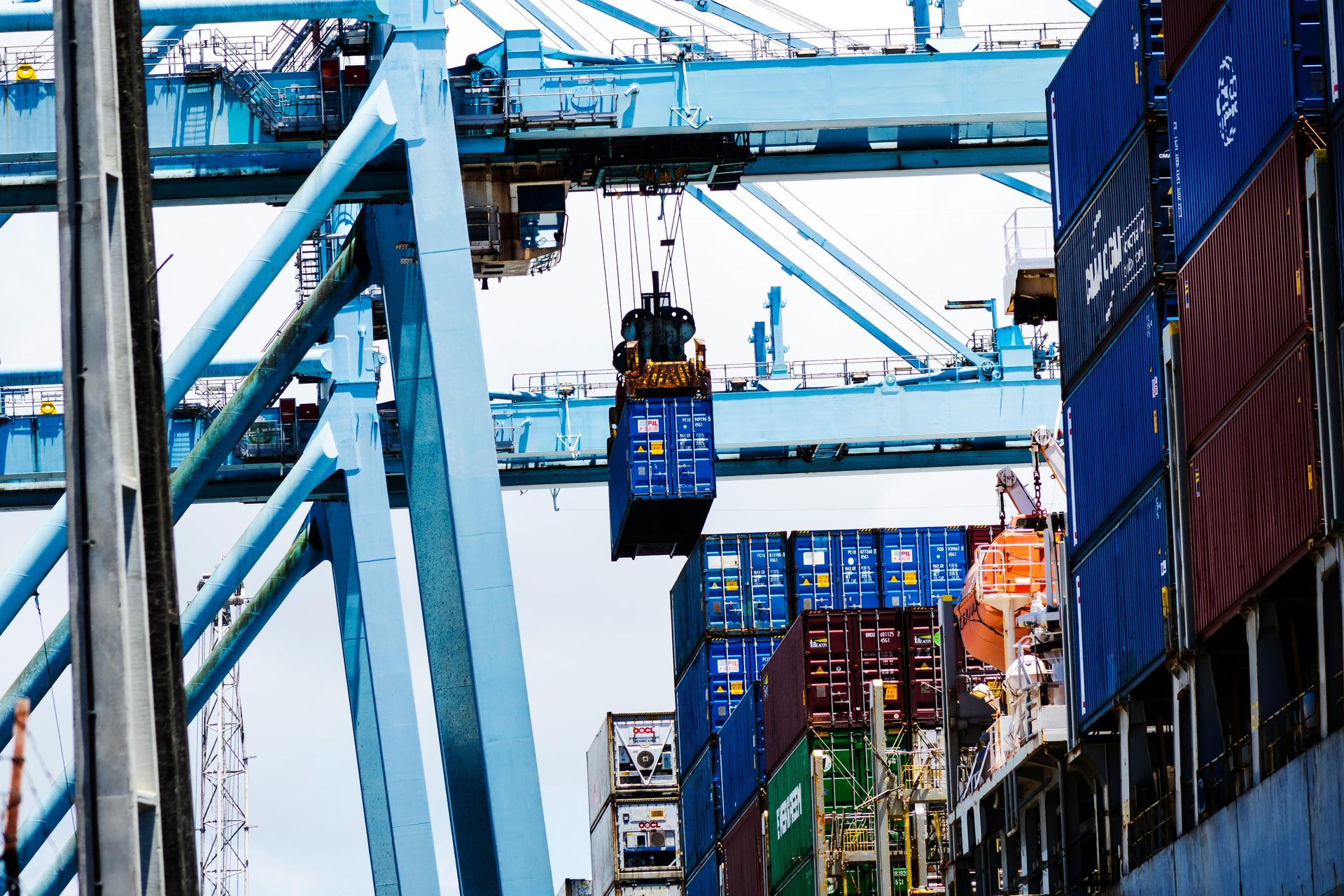 container being loaded on a cargo ship